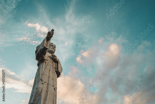 The statue of Jesus  Cristo de La Misericordia  on a blue colorful sky in Nicaragua San juan del sur