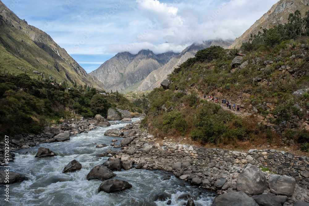 Hiking in the cloud forests and green valleys of the Inca Trail on the way to Machu Picchu in Peru Hiking in the cloud forests and green valleys of the Inca Trail on the way to Machu Picchu in Peru