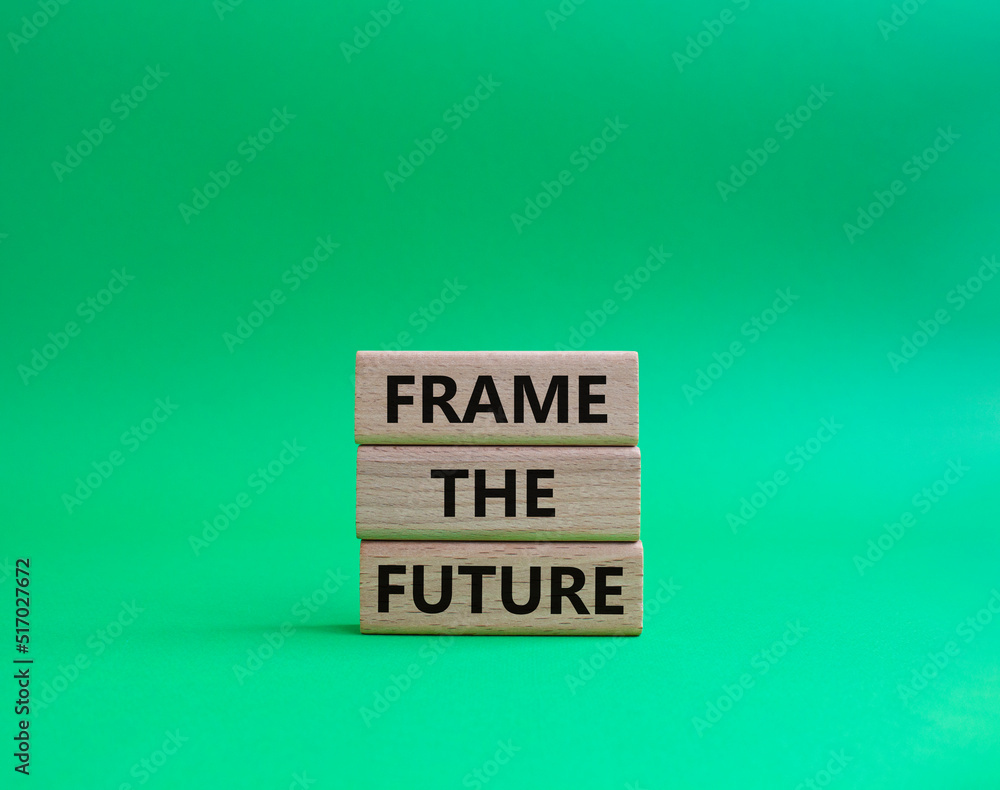 Frame the future symbol. Wooden blocks with words Frame the future. Beautiful green background. Business and Frame the future concept. Copy space. Frame the future symbol. Wooden blocks with words Frame the future. Beautiful green background. Business and Frame the future concept. Copy space.