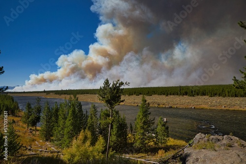 Distant view of a wildfire in Yellowstone National Park, Wyoming, United States