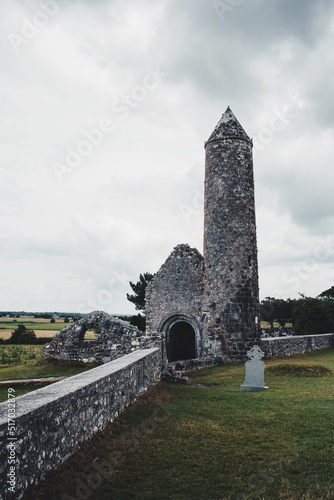 Vertical shot of the Clonmacnoise monastery in County Offaly, Ireland photo