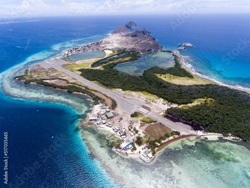 Aerial shot of Los Roques Archipelago in Venezuela surrounded with clear water