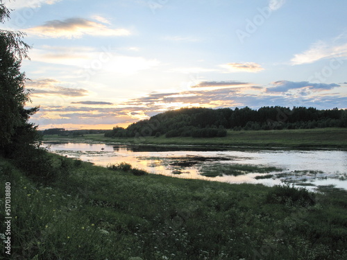 summer river in the countryside in the evening