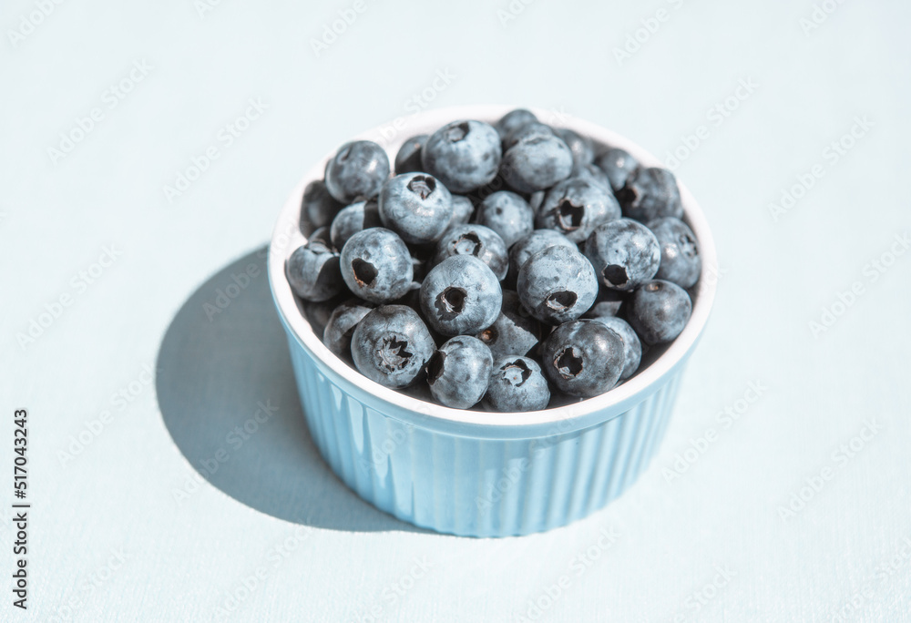 Blue blueberry on the table, card with organic fresh berries Blue blueberry on the table, card with organic fresh berries