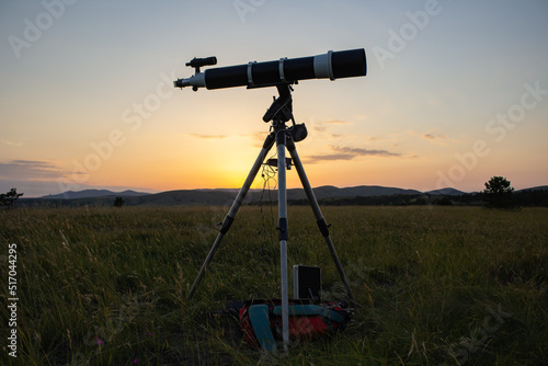 Astronomical telescope and equipment for observing stars, Milky way and planets in nature, far from light pollution and urban zones.