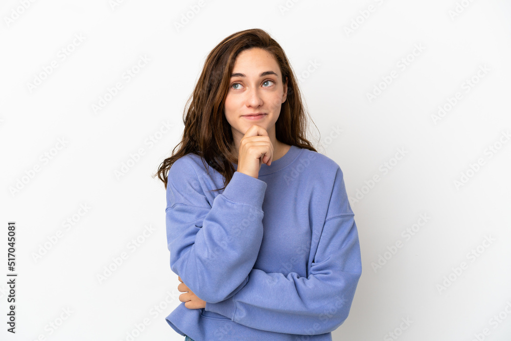Young caucasian woman isolated on white background thinking an idea while looking up Young caucasian woman isolated on white background thinking an idea while looking up
