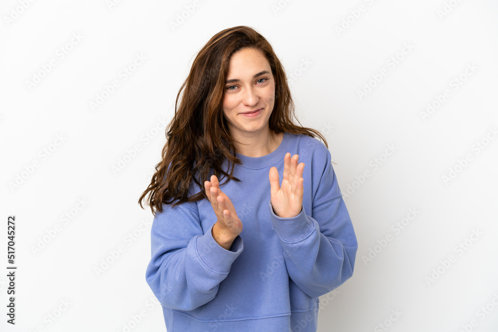 Young caucasian woman isolated on white background applauding after presentation in a conference Young caucasian woman isolated on white background applauding after presentation in a conference