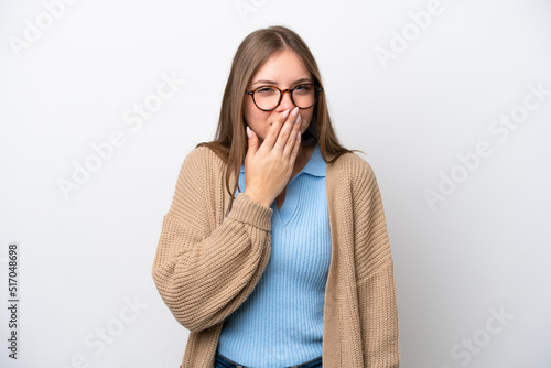 Young Lithuanian woman isolated on white background happy and smiling covering mouth with hand