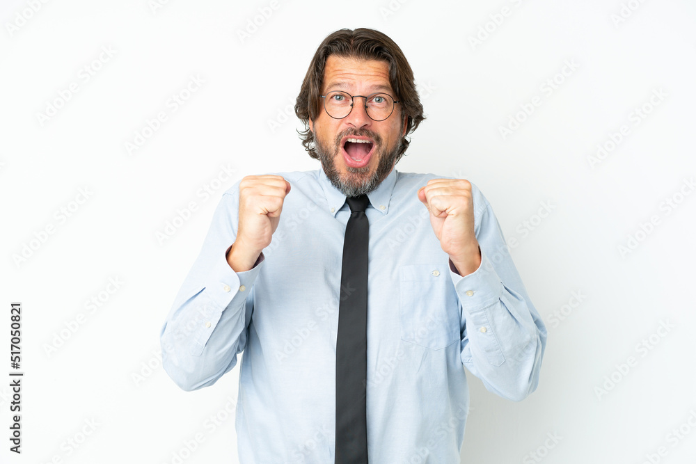 Senior dutch business man isolated on white background celebrating a victory in winner position Senior dutch business man isolated on white background celebrating a victory in winner position