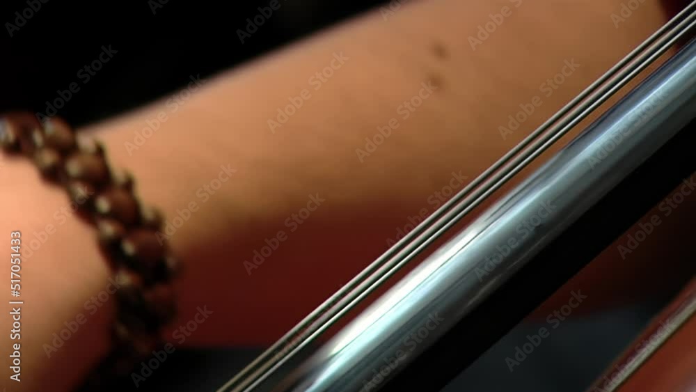 Woman playing a Cello in a Tango Ensemble in Buenos Aires, Argentina. Close Up. Woman playing a Cello in a Tango Ensemble in Buenos Aires, Argentina. Close Up.