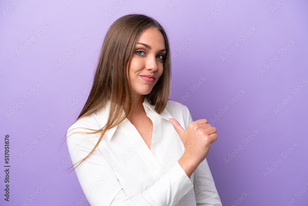 Young caucasian woman isolated on purple background proud and self-satisfied Young caucasian woman isolated on purple background proud and self-satisfied