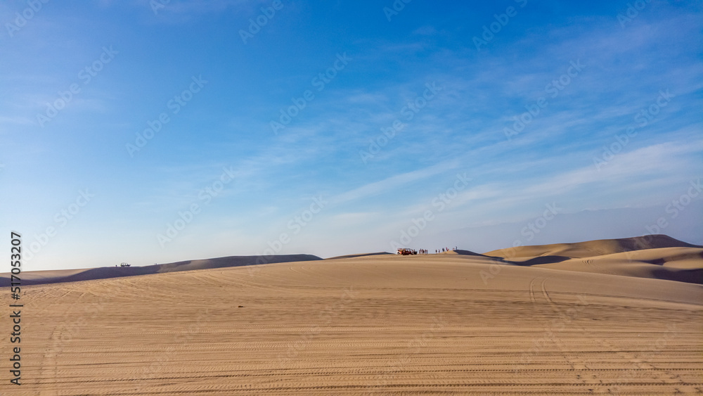 Obraz premium Huacachina is a desert oasis and a small village just west of the city of Ica in southwestern Peru