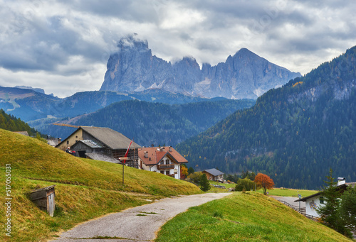 Gorgeous morning scene in Compaccio village and bright larchs. Location place Dolomiti alps  Seiser Alm or Alpe di Siusi  South Tyrol  Italy  Europe.