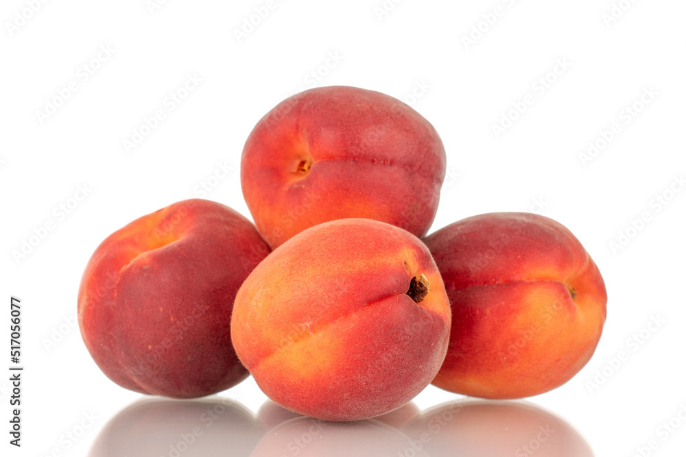 Several ripe red apricots, close-up, isolated on a white background. Several ripe red apricots, close-up, isolated on a white background.