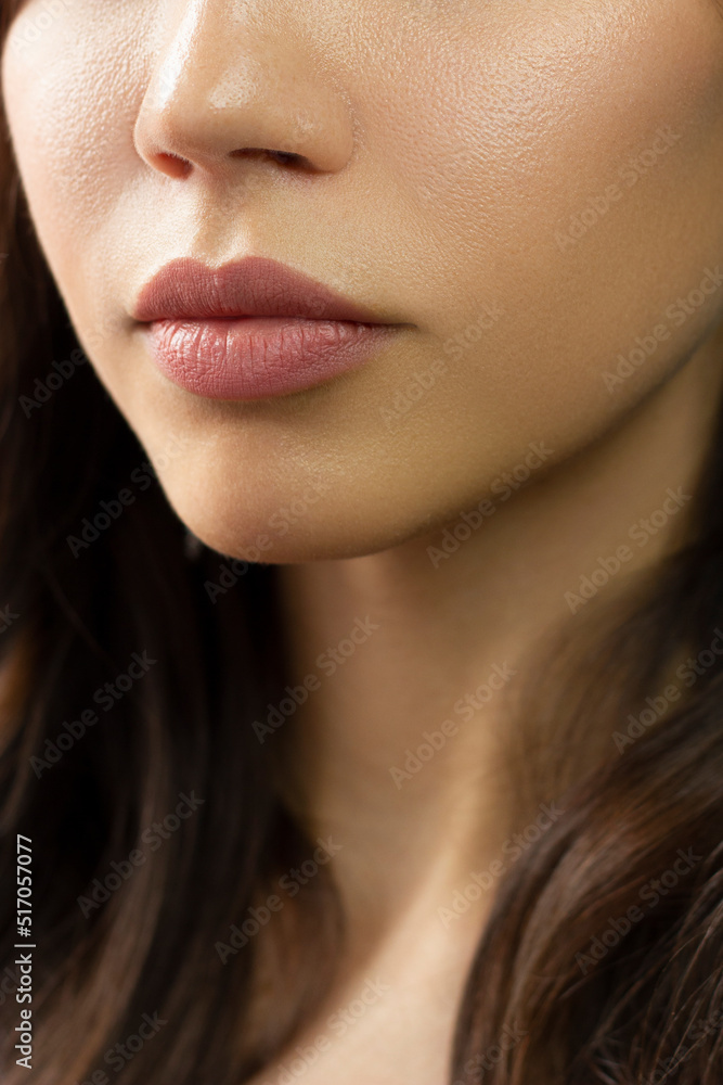 Sexual full lips. Natural gloss of lips and woman's skin. The mouth is closed. Increase in lips, cosmetology. Natural lips. Great summer mood with open eyes. fashion jewelry. Pink lip gloss