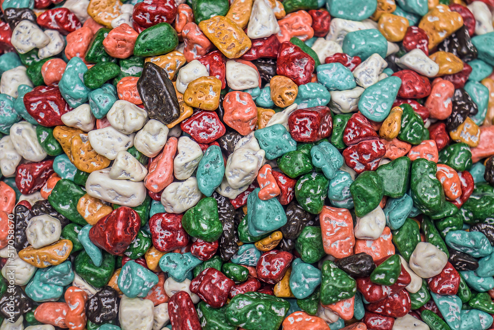 Colorful candy sea pebbles as an abstract background