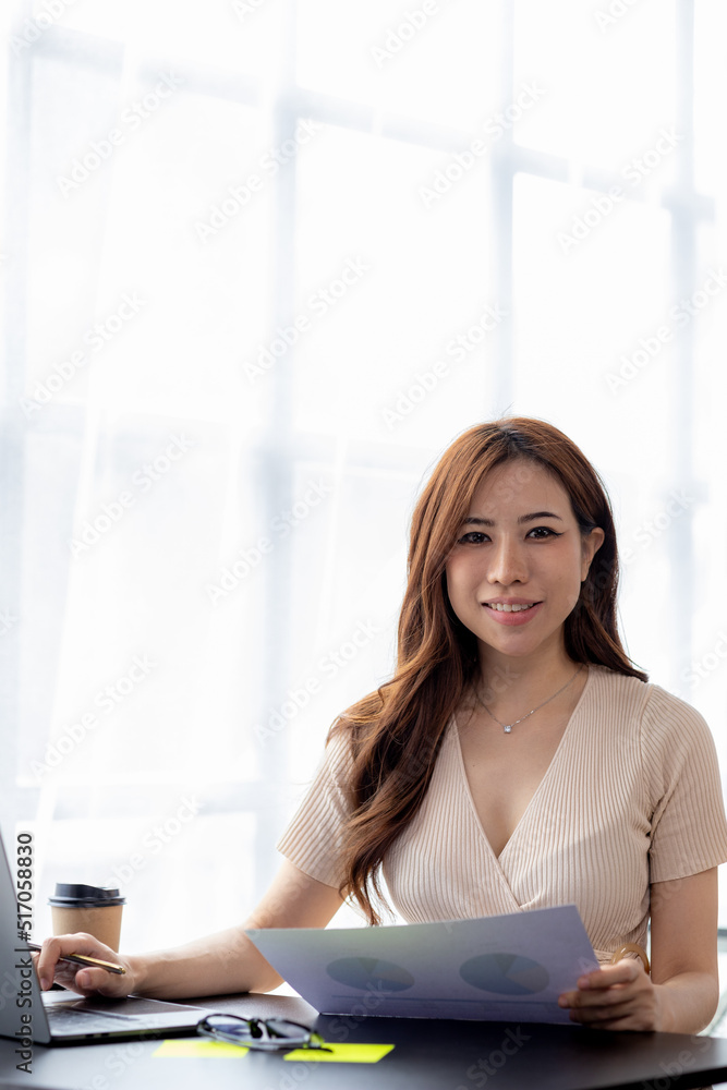Beautiful Asian woman is a businesswoman who leads a new generation of startups, a woman who runs and manages a business plan to build confidence and stability in business, woman-led business concept. Beautiful Asian woman is a businesswoman who leads a new generation of startups, a woman who runs and manages a business plan to build confidence and stability in business, woman-led business concept.