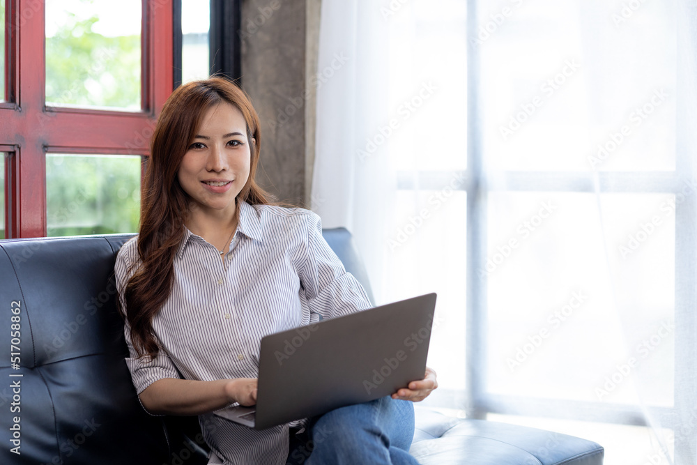 Business woman in the living room, she working from home due to the COVID-19 situation, she presenting to managers, online meeting via remote conferencing program. Work from home concept. Business woman in the living room, she working from home due to the COVID-19 situation, she presenting to managers, online meeting via remote conferencing program. Work from home concept.