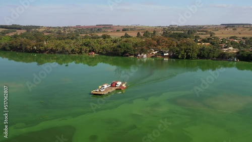 ferry for passengers and vehicles on the Tiete River between Itaju and Arealva photo