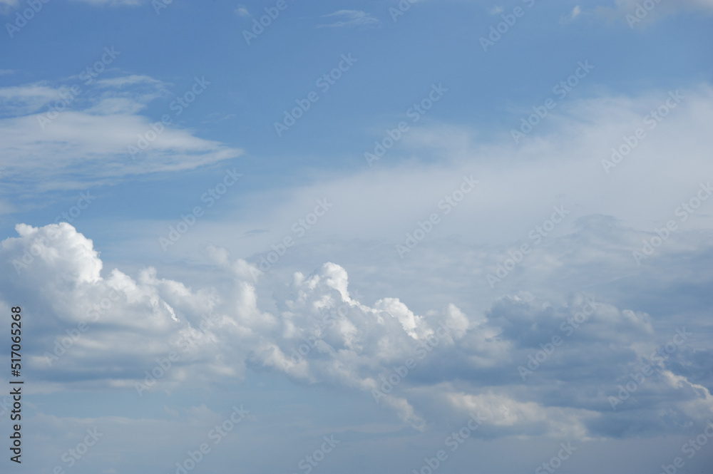 Scenic view of blue sky with white cumulus clouds, natural background Scenic view of blue sky with white cumulus clouds, natural background