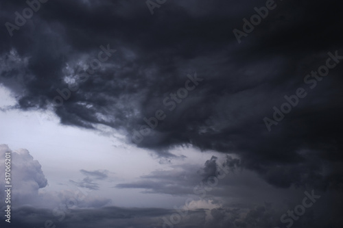 Scenic shot of dramatic sky with rainy clouds, natural backdrop  © Dmytro Hai