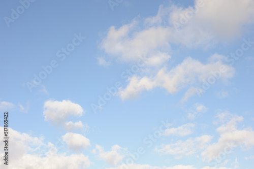 Scenic view of blue sky with white cumulus clouds, natural background © Dmytro Hai