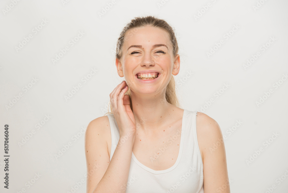 Portrait of a beautiful young women, dressed white T-shirt , isolated on white.emotional portrait of a young Ukrainian girl Portrait of a beautiful young women, dressed white T-shirt , isolated on white.emotional portrait of a young Ukrainian girl