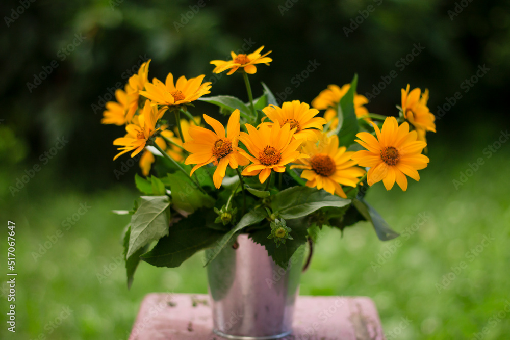 Fototapeta premium yellow flowers in a vase