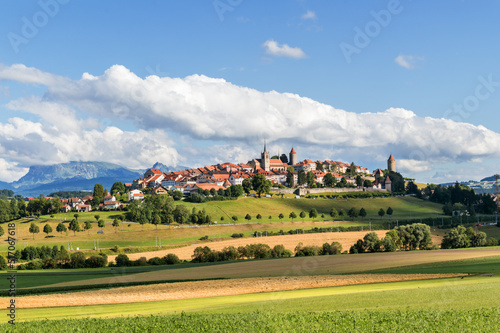 Panorama image of old Swiss town Romont, built on a rock prominence, in Canton Freibourg, Switzerland photo