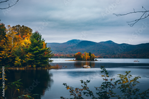 Beautiful fall colors in Vermont. River, mountains and trees. Landscape photography photo