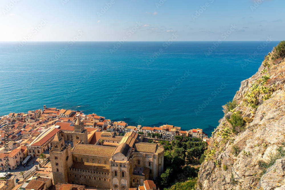 Cefalu, Sicily - Italy - July 7, 2020: Aerial view of Cefalu old town, Sicily, Italy. One of the major tourist attractions in Sicily. Picturesque view from Rocca di Cefalu.