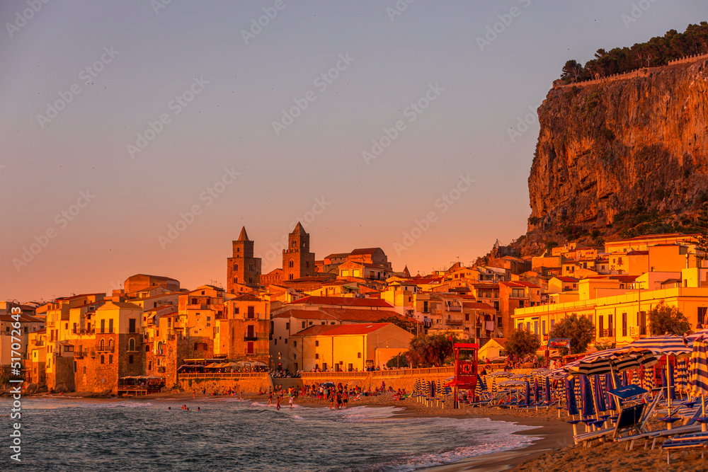 Cefalu, Sicily - Italy - July 7, 2020: Sunset over the medieval old town of Cefalu in Sicily in Italy