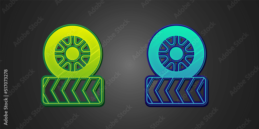 Green and blue Car tire wheel icon isolated on black background. Vector Green and blue Car tire wheel icon isolated on black background. Vector