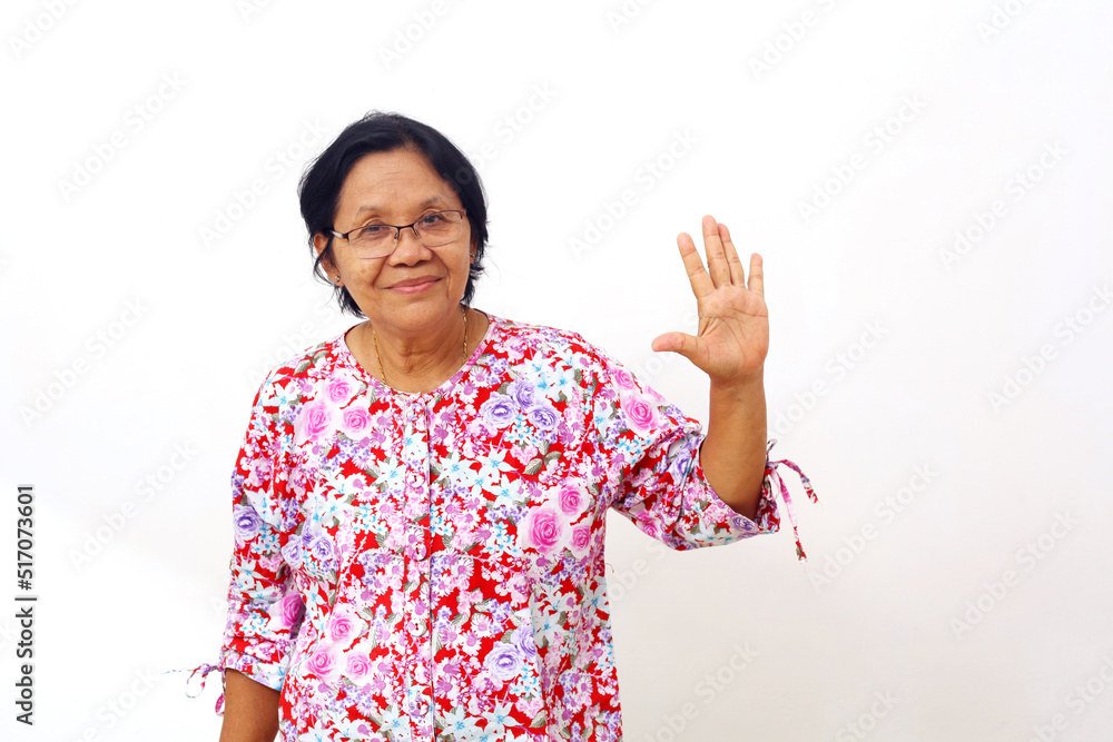 Happy asian elderly woman standing and showing five finger. Isolated on white background Happy asian elderly woman standing and showing five finger. Isolated on white background