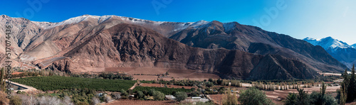 Paiguano or Paihuano panorama view of vineyards and snowy mountains in winter, Valle del Elqui in Elqui Province, Coquimbo Region.. photo