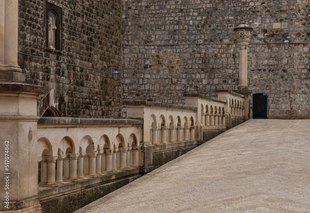 Slope and ancient Balustradess into the old town of Dubrovnik Slope and ancient Balustradess into the old town of Dubrovnik