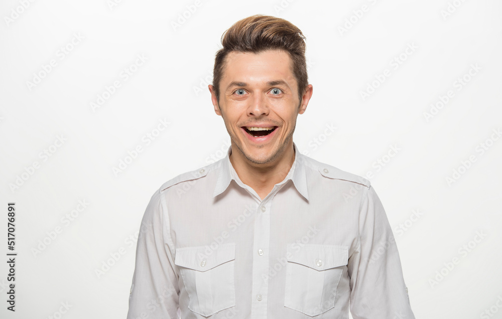 close-up portrait of a man in a white shirt on a white background isolated.portrait of a man with different emotions isolated. close-up portrait of a man in a white shirt on a white background isolated.portrait of a man with different emotions isolated.