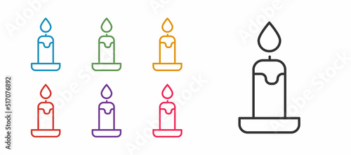 Set line Burning candle in candlestick icon isolated on white background. Cylindrical candle stick with burning flame. Set icons colorful. Vector