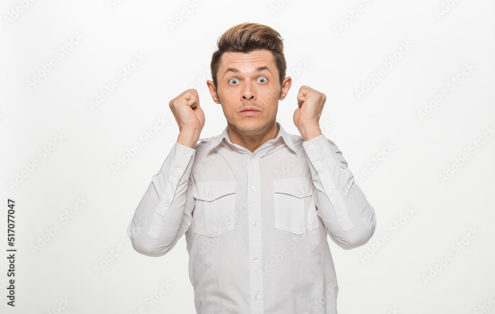 close-up portrait of a man in a white shirt on a white background isolated.portrait of a man with different emotions isolated. close-up portrait of a man in a white shirt on a white background isolated.portrait of a man with different emotions isolated.