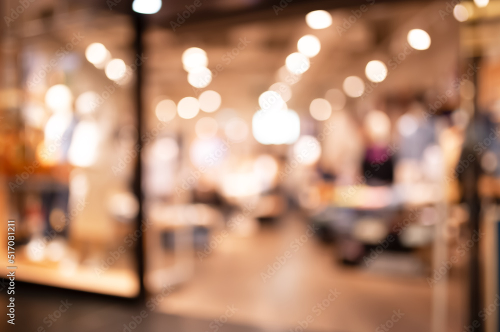 Blurred view of modern shopping mall interior