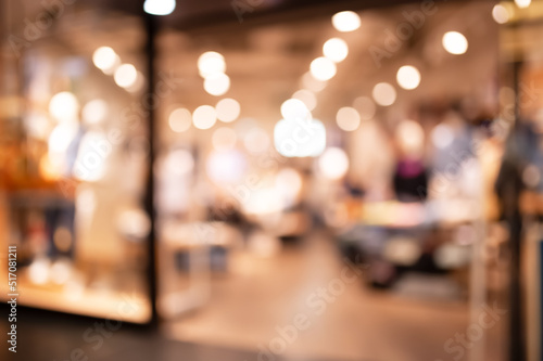 Blurred view of modern shopping mall interior