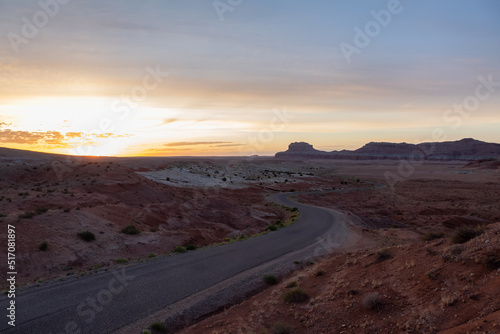 Scenic Road in Red Rock Mountains in the Desert at Sunrise. Spring Season. Goblin Valley State Park. Utah, United States. Nature Background.