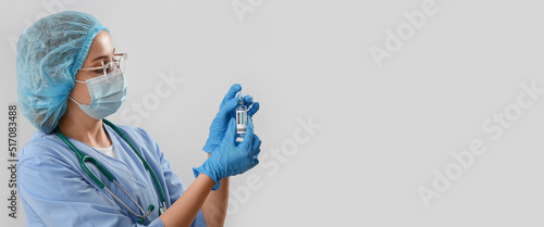 Female doctor holding monke...