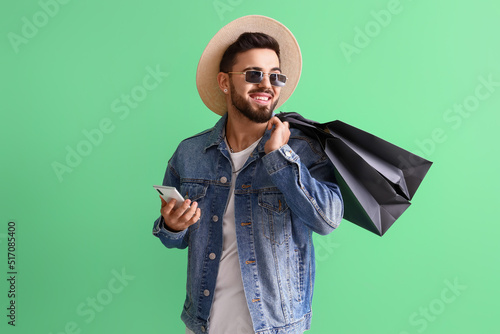 Handsome man with mobile ph...