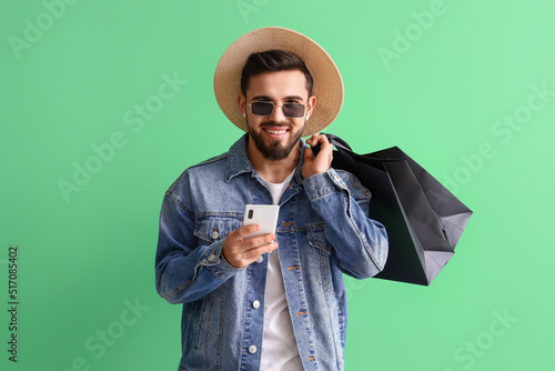 Handsome man with mobile ph...