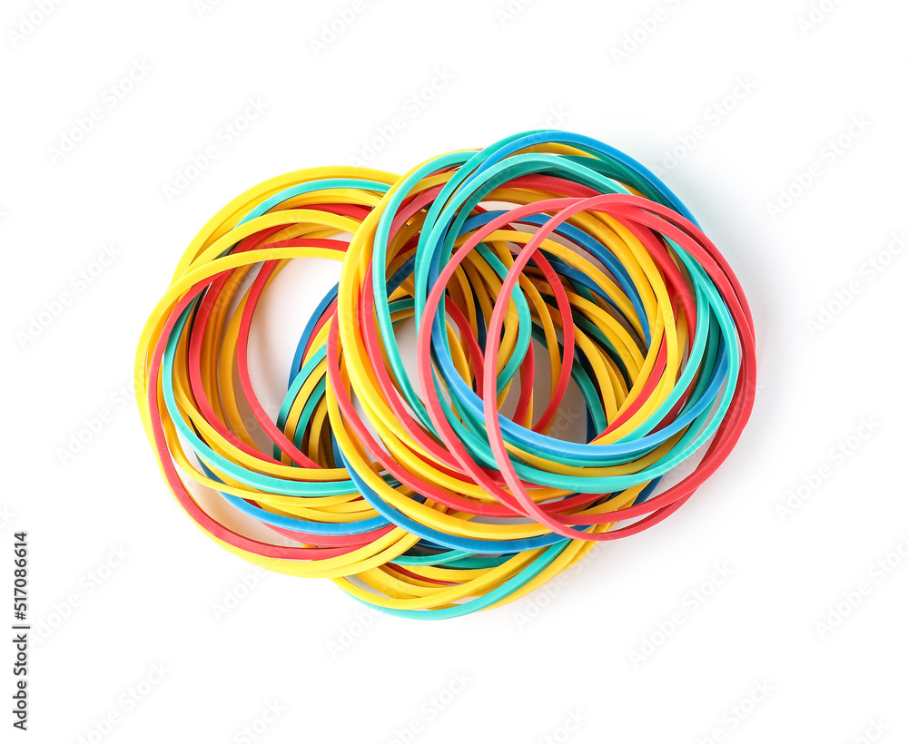 Many colorful rubber bands on white background