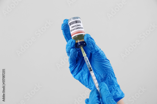 Hands of doctor with monkey...