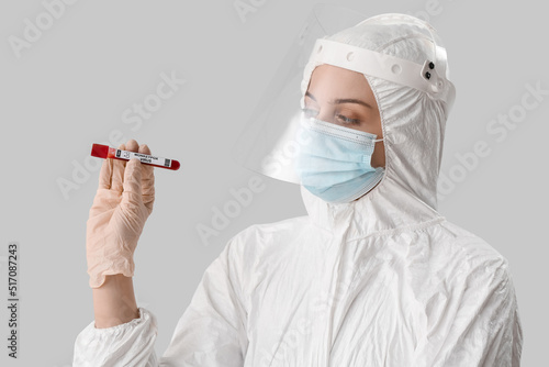 Scientist with sample of mo...