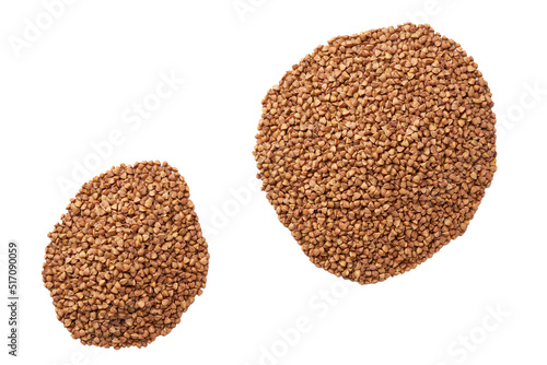 dry buckwheat isolated on white background top view. Pile raw buckwheat isolated on white background top view.