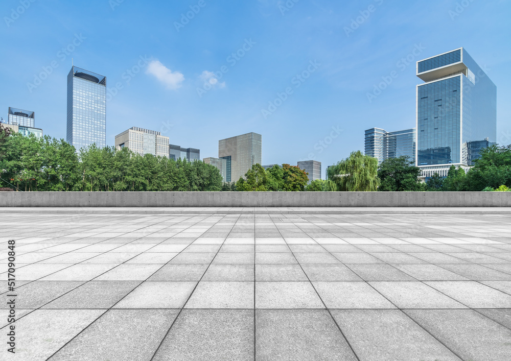 Fototapeta premium empty pavement and modern buildings in city